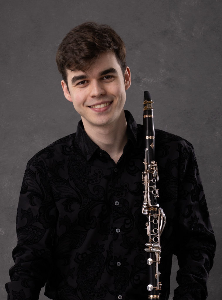 Photo of Ethan Burke with his clarinet